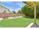 A lush green lawn and mature landscaping add to the home's privacy at 3921 W Jasper Dr, Chandler, AZ 85226