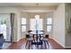 Bright breakfast nook featuring a round table, chairs, and large windows, perfect for a cozy dining experience at 3921 W Jasper Dr, Chandler, AZ 85226