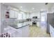 Bright kitchen featuring stainless steel appliances, granite countertops, and tile backsplash at 3921 W Jasper Dr, Chandler, AZ 85226