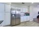 Spacious kitchen featuring stainless steel appliances and ample storage at 3921 W Jasper Dr, Chandler, AZ 85226