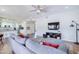 Open-concept living room with a view of the kitchen, creating a seamless space for entertaining guests at 3921 W Jasper Dr, Chandler, AZ 85226