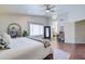 Bright main bedroom with ample natural light, ceiling fan, and a cozy atmosphere for restful nights at 3921 W Jasper Dr, Chandler, AZ 85226