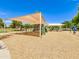 Community playground featuring swings, slides, and ample shade for enjoyment at 3921 W Jasper Dr, Chandler, AZ 85226