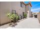 Exterior shot showing a practical side yard with air conditioning units and desert landscaping at 3921 W Jasper Dr, Chandler, AZ 85226