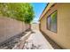 Exterior shot featuring a narrow side yard with a paver walkway and block wall at 3921 W Jasper Dr, Chandler, AZ 85226