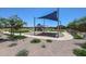 Community park with a shaded playground, offering a fun and safe environment for children to play at 39985 W Sparks Ln, Maricopa, AZ 85138