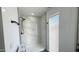 Modern bathroom features a tile shower with a glass enclosure at 4125 W Villa Rita Dr, Glendale, AZ 85308