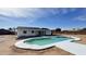 Backyard features a refreshing in-ground pool perfect for outdoor enjoyment and relaxation under the sun at 4125 W Villa Rita Dr, Glendale, AZ 85308
