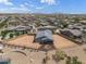 An aerial view of a single-Gathering home with a large backyard in a residential neighborhood at 435 E Shellie Ct, Casa Grande, AZ 85122
