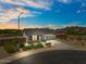 Charming single-story home featuring a two-car garage, well-maintained landscaping, and a welcoming entrance at 435 E Shellie Ct, Casa Grande, AZ 85122