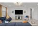 Bright living room with comfortable seating, modern lighting, and stylish decor at 435 E Shellie Ct, Casa Grande, AZ 85122