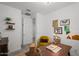 Bright home office with modern desk, colorful art, and comfortable yellow chair at 435 E Shellie Ct, Casa Grande, AZ 85122