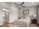 Staged bedroom with hardwood floors and ensuite bathroom access at 4401 N 24Th Pl, Phoenix, AZ 85016