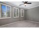 Unfurnished bedroom with large windows, carpeted floors, ceiling fan and recessed lighting at 4401 N 24Th Pl, Phoenix, AZ 85016