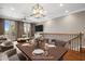 Dining area with hardwood floors, modern light fixture and large glass doors at 4401 N 24Th Pl, Phoenix, AZ 85016