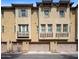 Attractive townhome featuring multi-car garages, decorative balconies, and architectural details at 4401 N 24Th Pl, Phoenix, AZ 85016