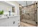 Spa-like bathroom with modern vanity, a large shower, and elegant finishes at 4910 E Shaw Butte Dr, Scottsdale, AZ 85254
