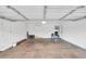 Spacious and uncluttered garage with ample room for parking and storage, ready for your personal touch at 4910 E Shaw Butte Dr, Scottsdale, AZ 85254