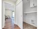This laundry area includes convenient storage, tile flooring, and easy access, enhancing functionality at 4910 E Shaw Butte Dr, Scottsdale, AZ 85254