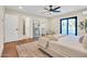 Bright and airy primary bedroom with ensuite bathroom, closet, and access to the backyard at 4910 E Shaw Butte Dr, Scottsdale, AZ 85254