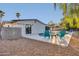 Backyard oasis with a refreshing pool, complemented by lounge seating and desert landscaping at 4910 E Shaw Butte Dr, Scottsdale, AZ 85254