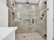 Modern shower with sleek tile, glass enclosure, and premium fixtures for a spa-like experience at 4910 E Shaw Butte Dr, Scottsdale, AZ 85254