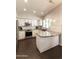 Bright kitchen featuring stainless steel appliances, granite countertops, and white cabinetry at 5132 E Grandview Rd, Scottsdale, AZ 85254