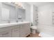 Bathroom with double sink vanity, mirrors, and a shower-tub combination at 540 N May -- # 3117, Mesa, AZ 85201
