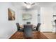 Charming dining area with a round table, modern chairs, and elegant decor at 540 N May -- # 3117, Mesa, AZ 85201