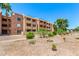 Multi-story apartment complex with balconies and desert landscaping at 540 N May -- # 3117, Mesa, AZ 85201