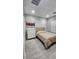 Bedroom featuring light floors, neutral decor, and plantation shutters, providing comfort and style at 5490 W Trenton Way, Florence, AZ 85132