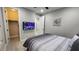 Stylish bedroom with wood-look floors, ceiling fan, and a walk-in closet for a comfortable lifestyle at 5490 W Trenton Way, Florence, AZ 85132