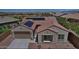 Beautiful single-story home with a two-car garage, solar panels, and low-maintenance desert landscaping at 5490 W Trenton Way, Florence, AZ 85132