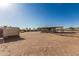 A large dirt area ideal for horse property or RV parking at 6032 W Grovers Ave, Glendale, AZ 85308