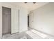 View of standard closet space and potential for customization with new flooring at 6032 W Grovers Ave, Glendale, AZ 85308