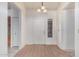 Entryway displaying neutral walls, tile floors, and a front door with a window at 6032 W Grovers Ave, Glendale, AZ 85308