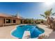 Enjoy the sparkling pool, diving board, and plenty of patio space at 6032 W Grovers Ave, Glendale, AZ 85308