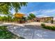 A charming community playground area with play equipment and shaded picnic spots at 7231 W Lone Cactus Dr, Glendale, AZ 85308