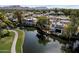 Stunning aerial view of luxury waterfront homes surrounded by lush landscape at 7272 E Gainey Ranch Rd # 29, Scottsdale, AZ 85258