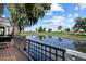 Backyard featuring a water view from the deck, overlooking the golf course at 7272 E Gainey Ranch Rd # 29, Scottsdale, AZ 85258