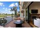 Relaxing patio with seating area and views of the lake and golf course at 7272 E Gainey Ranch Rd # 29, Scottsdale, AZ 85258