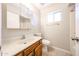 Bathroom featuring tile floors, modern vanity with a combo shower/tub at 7439 E Ed Rice Ave, Mesa, AZ 85208
