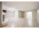 Inviting living room showcases a fireplace, tile flooring, and neutral wall colors at 7439 E Ed Rice Ave, Mesa, AZ 85208