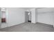 Spacious bedroom with closet and door to the hallway at 8002 E Whitton Ave, Scottsdale, AZ 85251