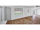 Bright room with large windows, tile floors, and neutral paint create a welcoming and airy atmosphere at 8002 E Whitton Ave, Scottsdale, AZ 85251