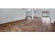 Open floor plan featuring seamless living space with tile flooring and bright, natural light at 8002 E Whitton Ave, Scottsdale, AZ 85251
