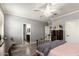 Main bedroom includes views to the bath, wood floors, and neutral colors at 8113 S 42Nd Dr, Laveen, AZ 85339