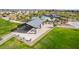Community aerial view highlighting a covered picnic area, lush green spaces, and a nearby swimming pool at 8318 W Palo Verde Dr, Glendale, AZ 85305