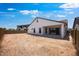 Spacious backyard with ample space, a covered patio, and views of neighboring homes at 8318 W Palo Verde Dr, Glendale, AZ 85305