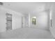 Spacious bedroom boasts plush carpeting, walk-in closet, and neutral palette at 8318 W Palo Verde Dr, Glendale, AZ 85305